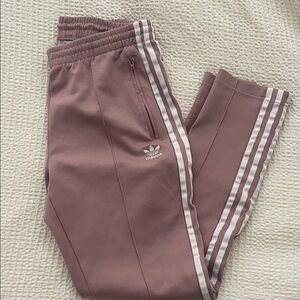 Adidas Women's Mauve Joggers with White Stripes